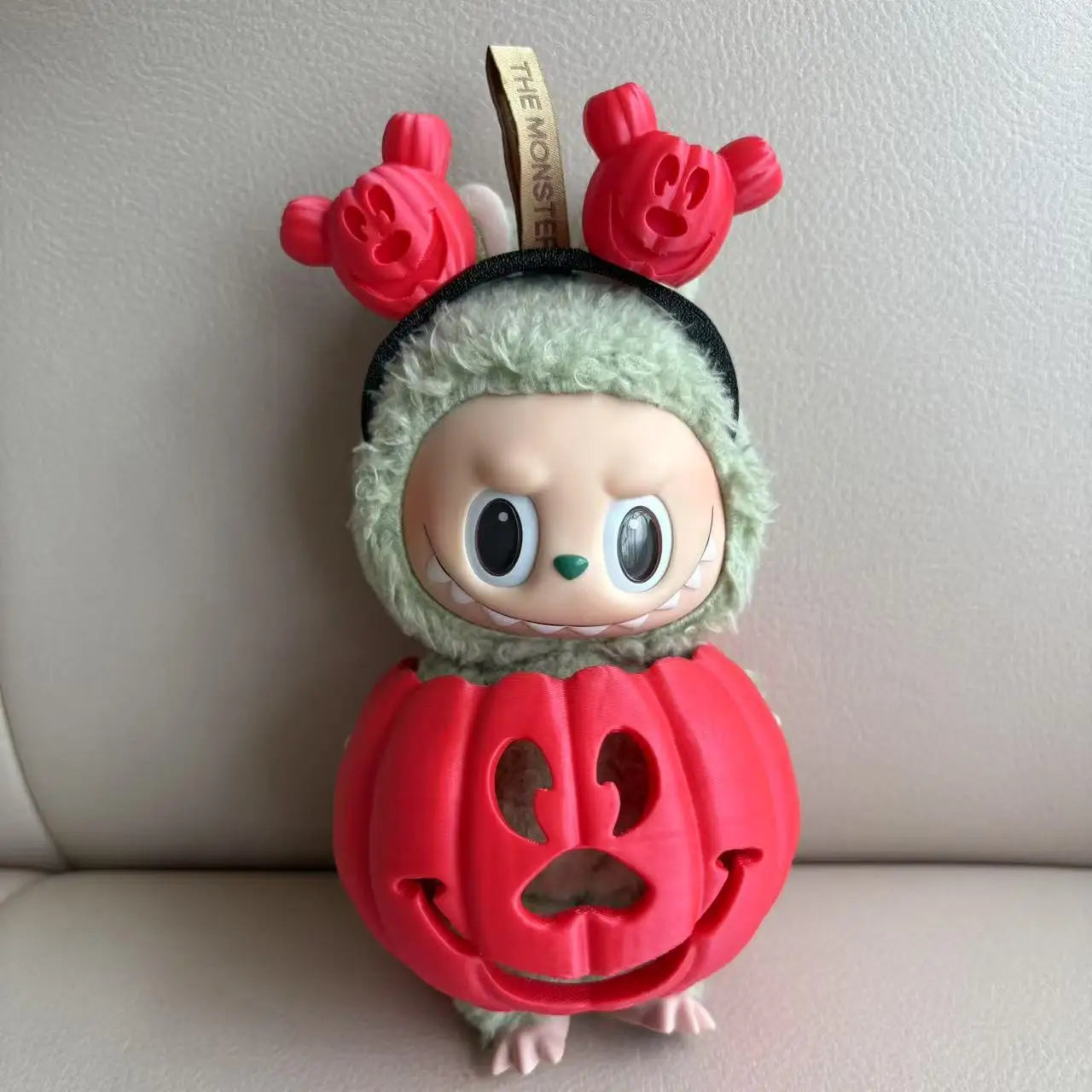 Rainbow Pumpkin Trickster Figurine