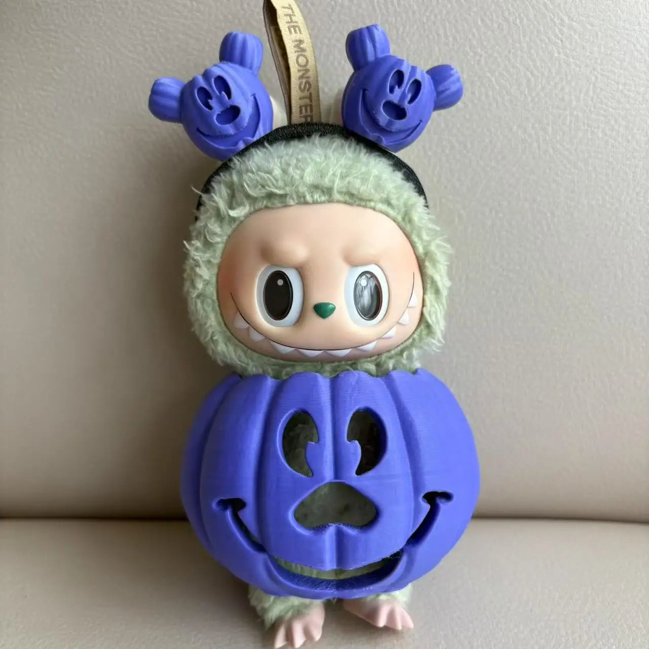 Rainbow Pumpkin Trickster Figurine