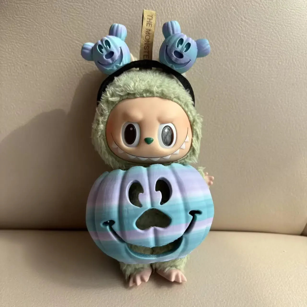 Rainbow Pumpkin Trickster Figurine