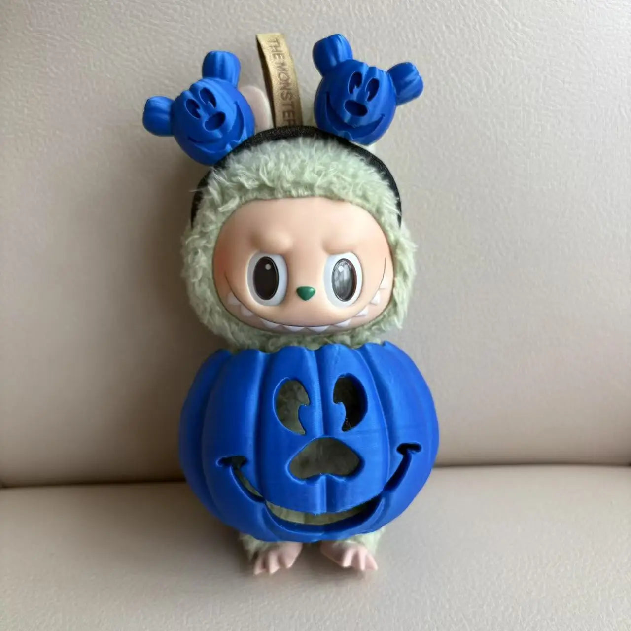 Rainbow Pumpkin Trickster Figurine