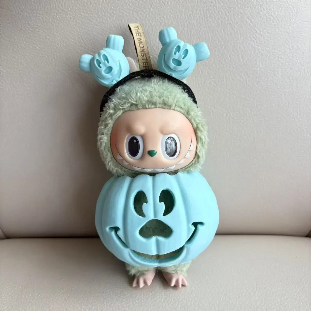 Rainbow Pumpkin Trickster Figurine