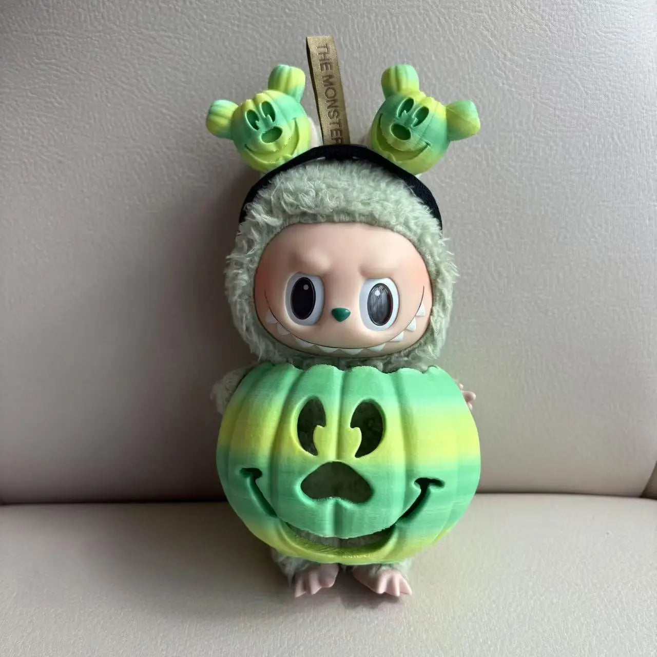 Rainbow Pumpkin Trickster Figurine